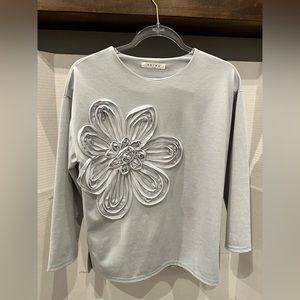 Light blue blouse with 3D chiffon flower